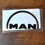 Adesivo Resinado Tampa Cubo MAN 6,5 x 3,5cm - Imagem 2